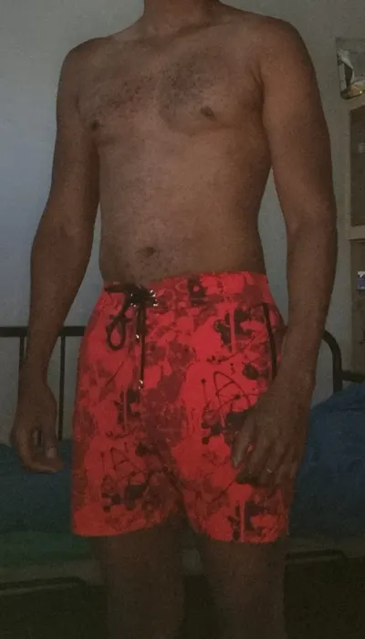 Customer photo from Guillan C. review of Splatter Swim Shorts Red - 5"