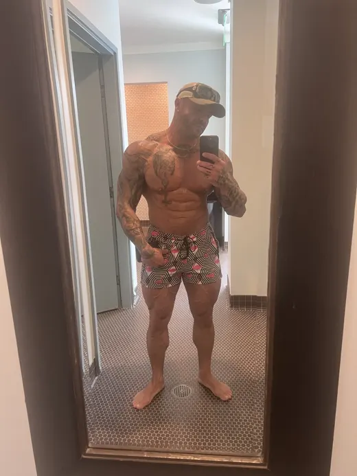 Customer photo from Kelly R. review of Flamingo Hectagon White Swim Shorts