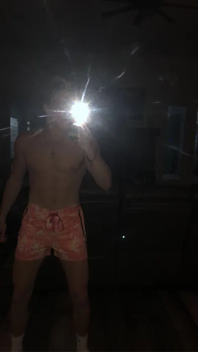 Customer photo from Owen M. review of Peach Palms Swim Shorts
