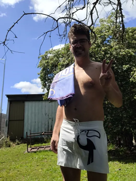 Customer photo from Joshua B. review of White Tucann Original Swim Shorts - 3"