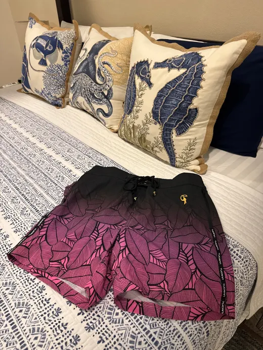 Customer photo from Russell B. wearing Black Leaf Magenta Swim Trunks - 5"