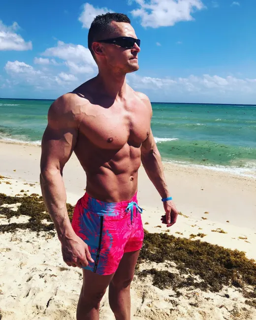 Customer photo from Travis W. review of Flower Stripes Pink Swim Shorts