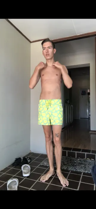 Customer photo from Talon S. wearing Watermelon Striped Black Swim Shorts