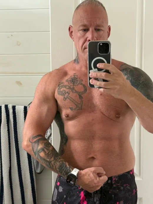 Customer photo from Michael G. wearing Splatter Swim Shorts Blue - 5"