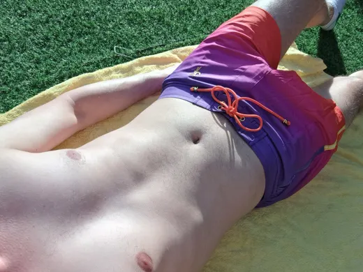 Customer photo from Calleb B. review of Faded Crimson Swim Shorts