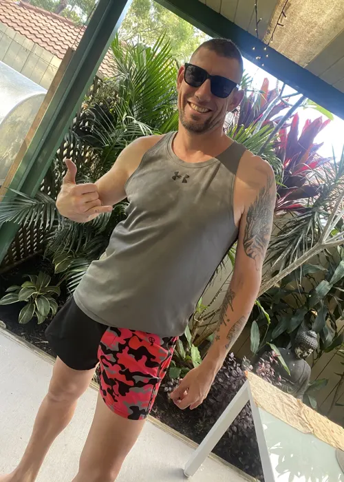 Customer photo from Jamie P. review of Split Camo Red Swim Shorts - 3"