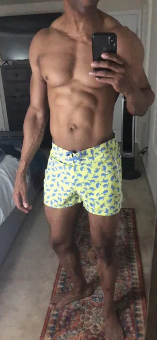 Customer photo from Claude H. review of Blue Turtles Yellow Swim Shorts - 3"