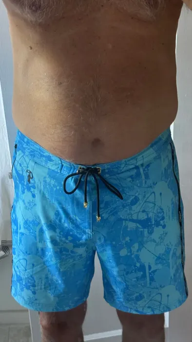 Customer photo from Brian P. wearing Splatter Swim Shorts Blue - 7"
